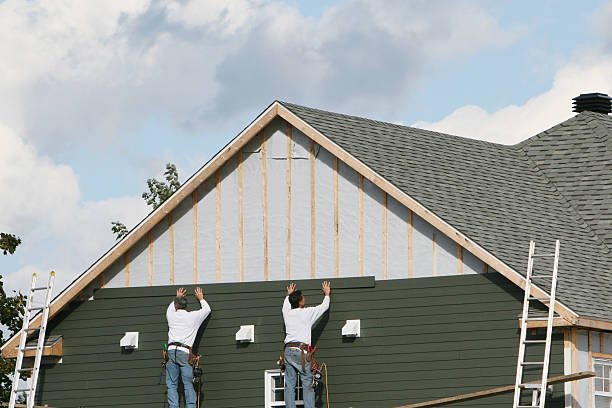 Professional Siding Installation technician working in Farnham, VA
